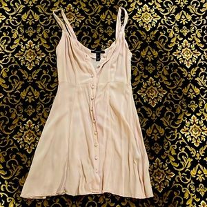 Pale pink flowy button up dress